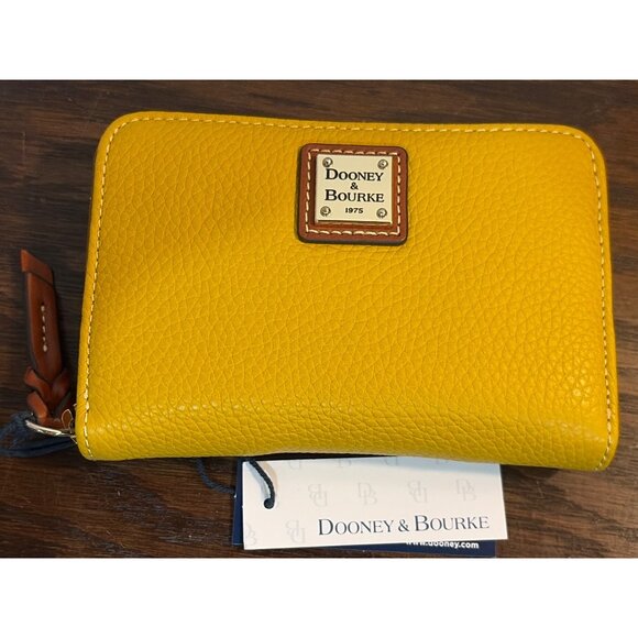 Dooney & Bourke Handbags - Dooney & Bourke Pebble Grain Continental Clutch Wallet Mustard Color NWT